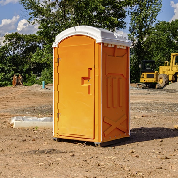 what is the cost difference between standard and deluxe portable restroom rentals in Delong Indiana